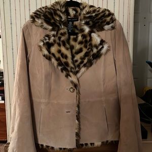 Warm and Fuzzy worn only a few times. Leopard interior and Genuine Leather